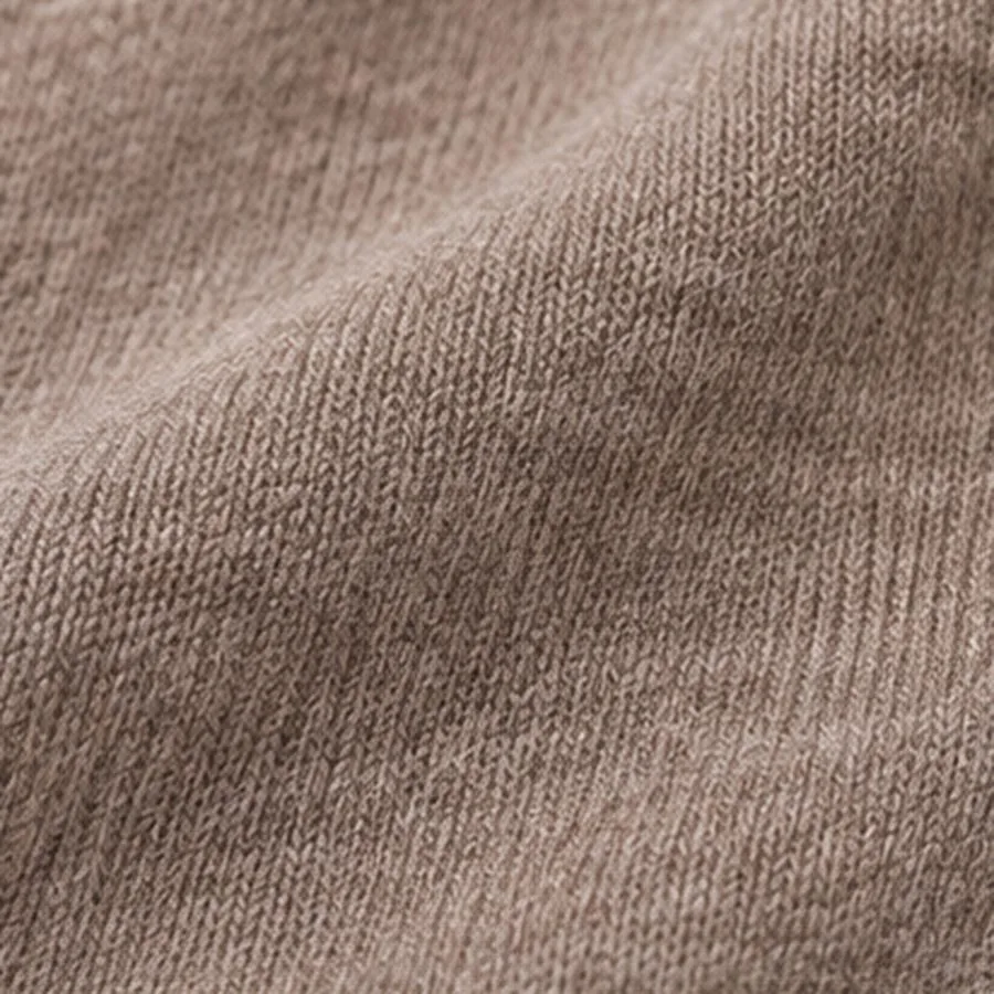Warm taupe fleece, the brushed nap turned back to show its knit ground