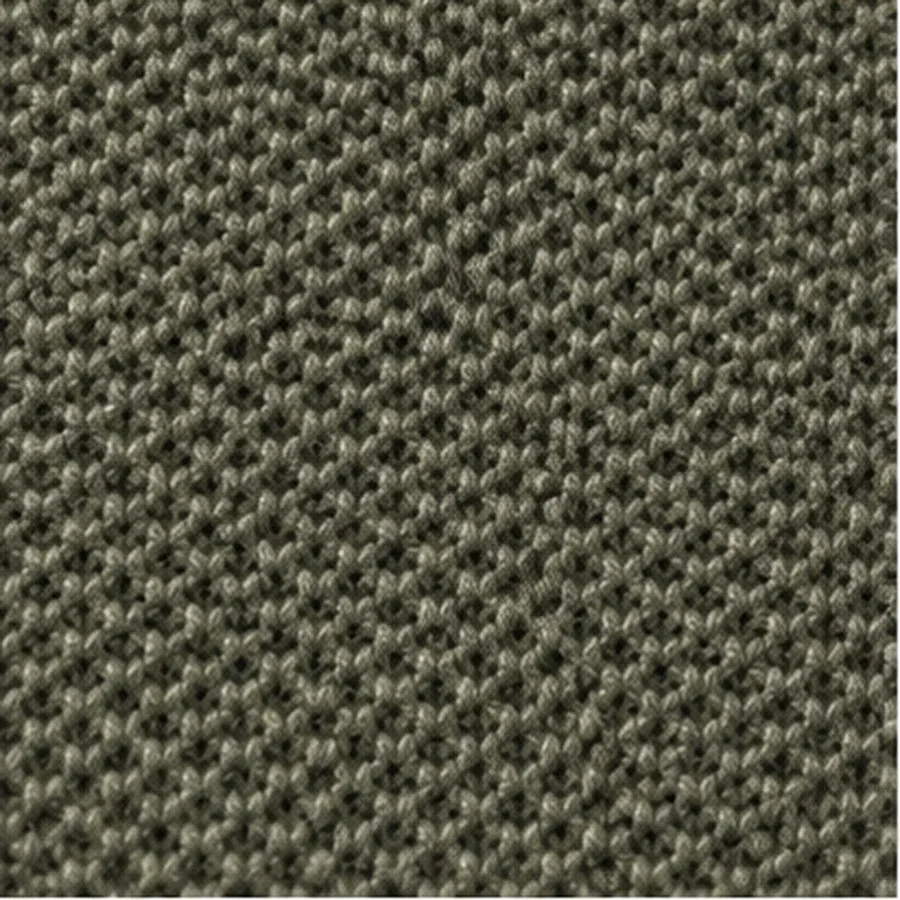 Olive cotton pique, the raised birdseye grid at close range